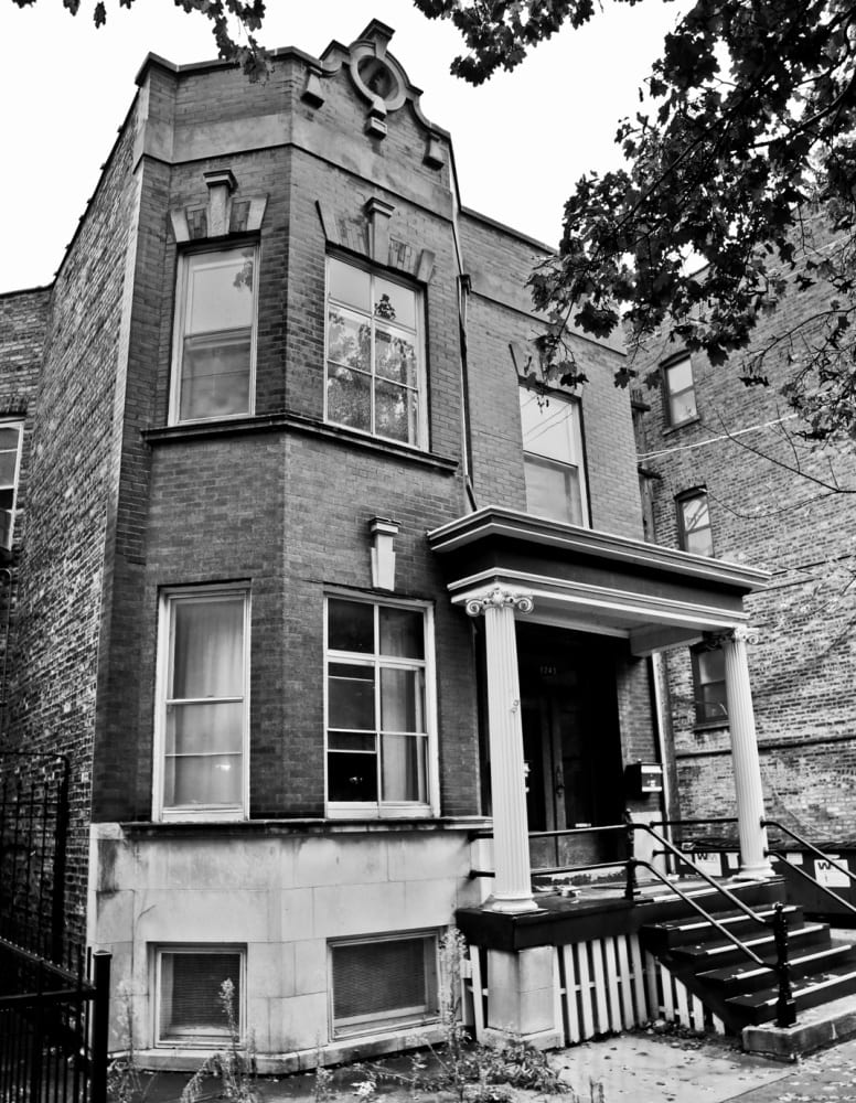 the 1897 two-story residence built on the site of the cottage