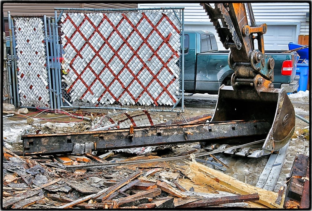 intact notched sill beam comprised of yellow pine wood. the backhoe operator successfully extracted the beam and placed it near our awaiting truck. it will be brought back for further analysis and photo-documentation.