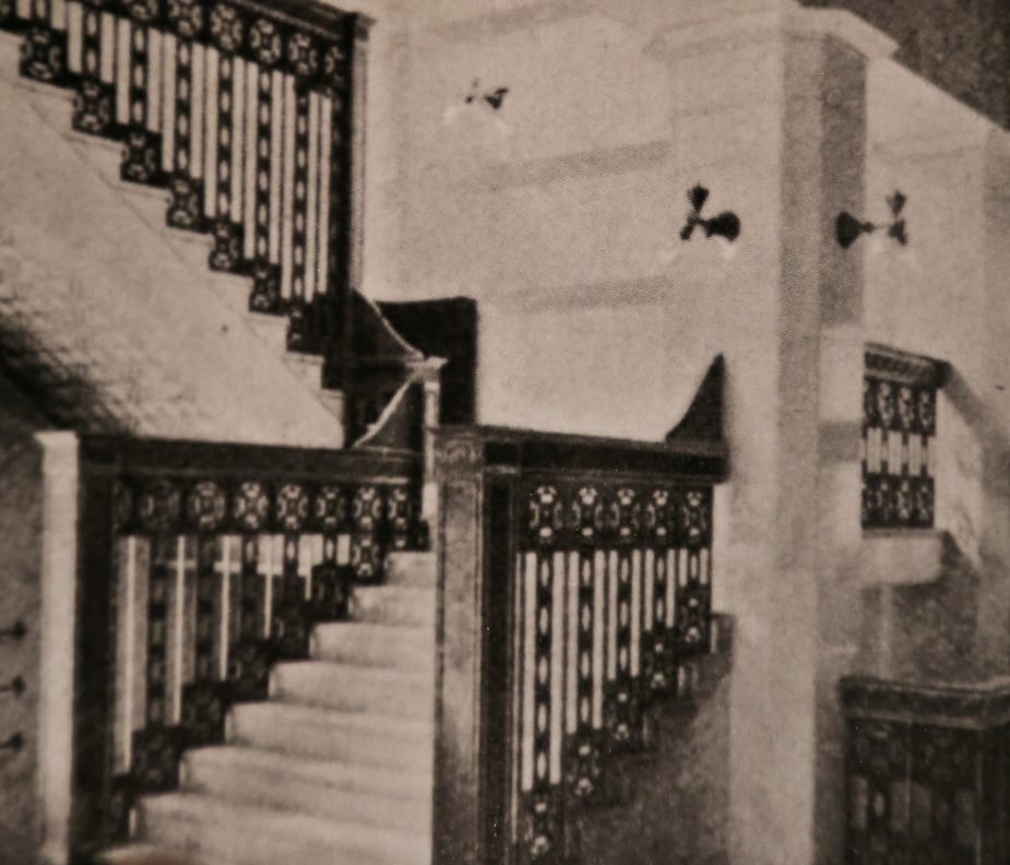 interior photograph of the chicago stock exchange with the electrolier sconces shown "in situ."